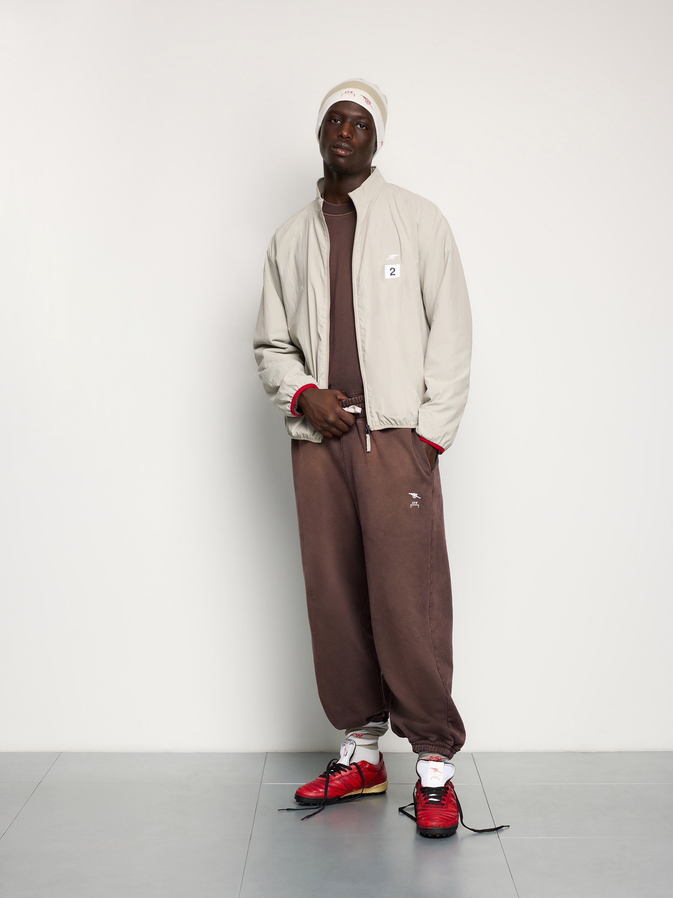 ACW* Arsenal F.C. Colney Track Jacket Stone – A-COLD-WALL*